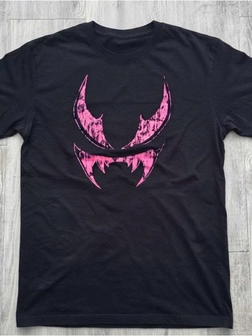 Black Short Sleeve Tee with Pink Distressed Graphic